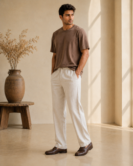 Three-quarter view of men’s cream cotton linen pajama pants with relaxed straight fit