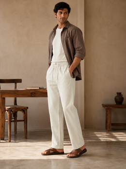 Men wearing white straight-fit cotton linen pajama pants in alternate front view