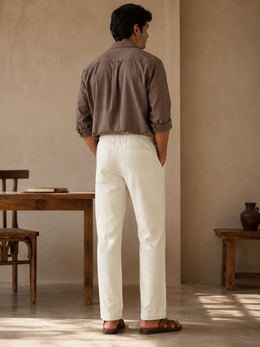 Side view of white cotton linen pajama pants with slant pocket